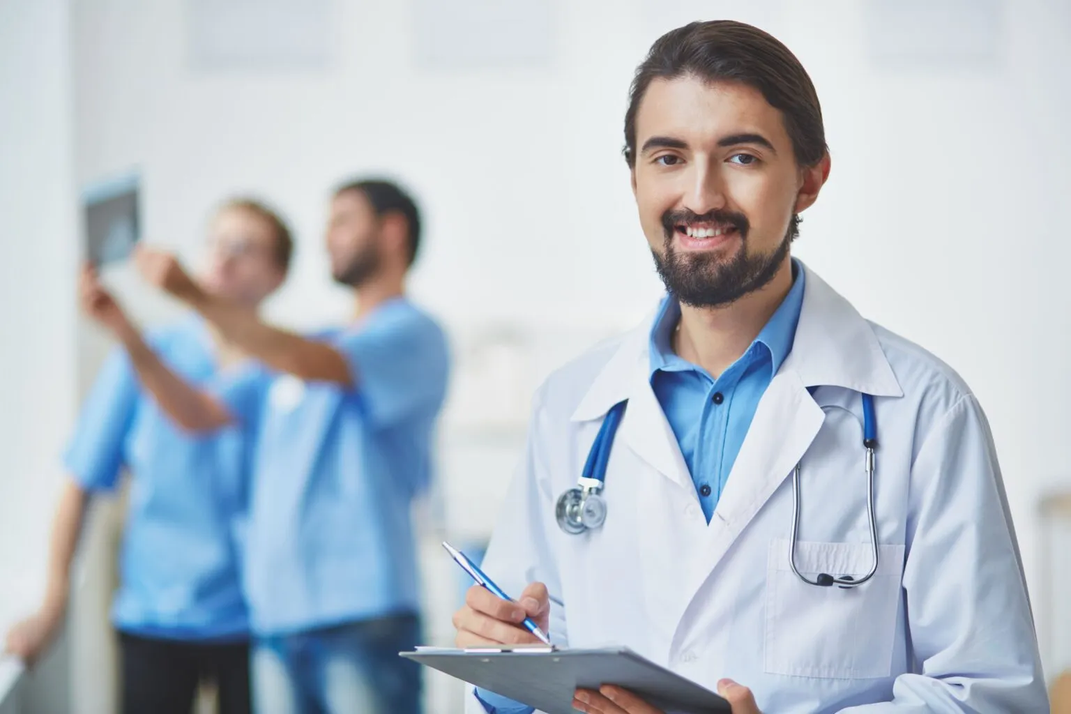 physician-reviewing-his-notes